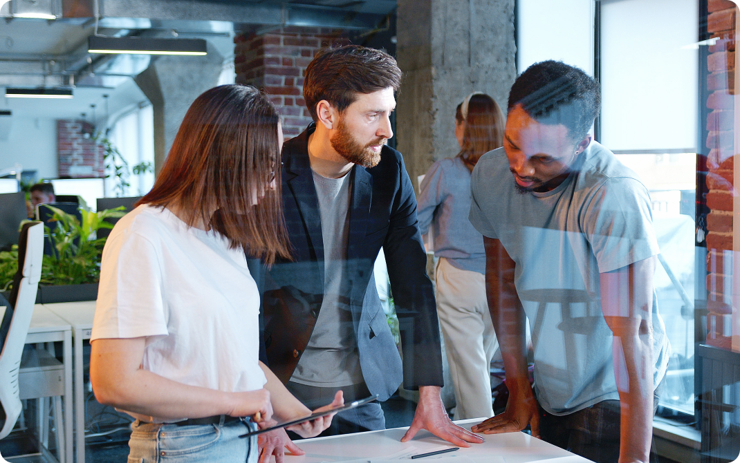 Three people collaborating